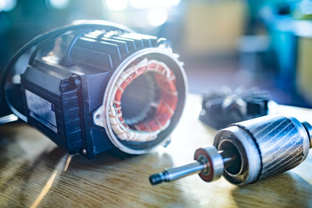 Close-up of iron industrial motor lies on a table