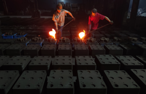 Casting workers pouring melton iron at Castimoo