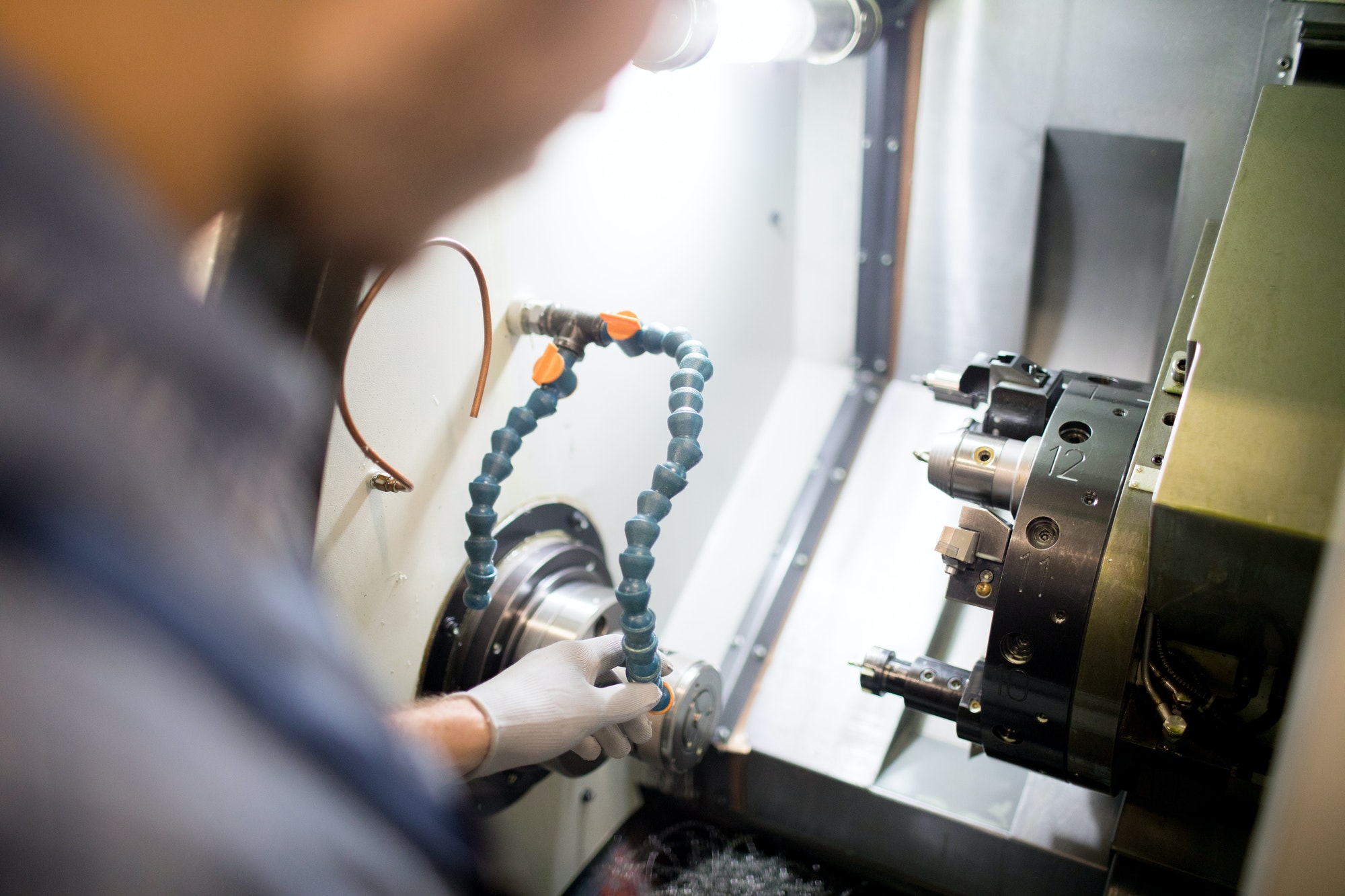 Man working on lathe machine