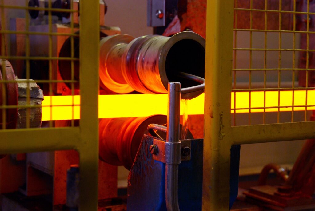 Hot steel blanks coming out of furnace