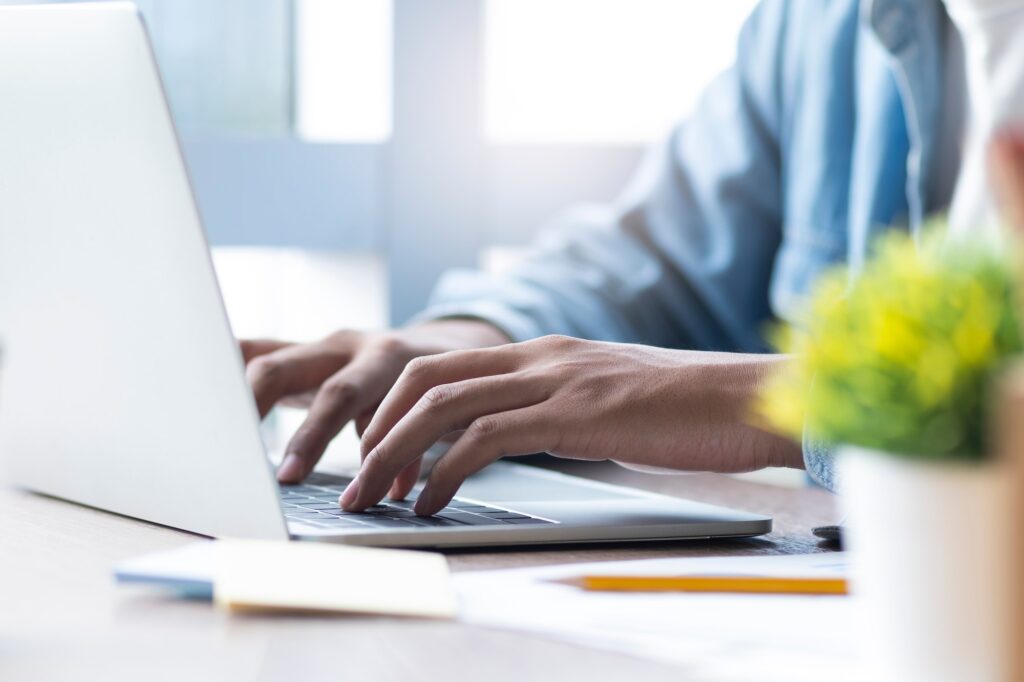 Man using computer laptop.