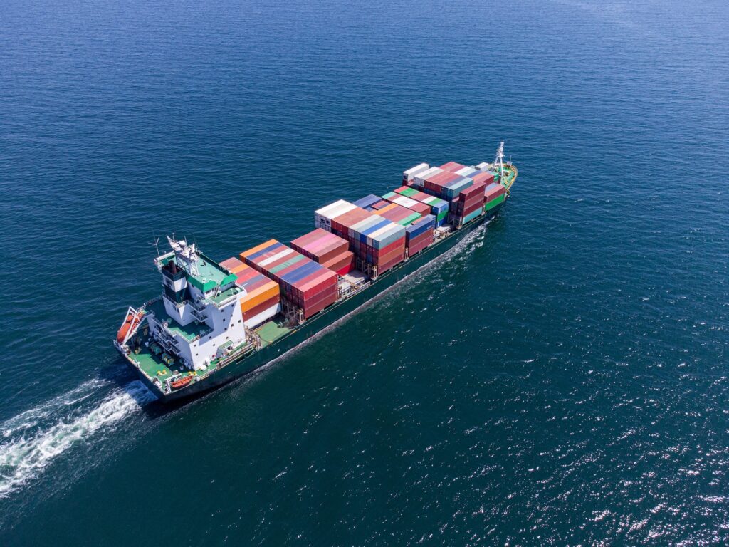 Aerial top view container ship, shipping or transportation concept background.