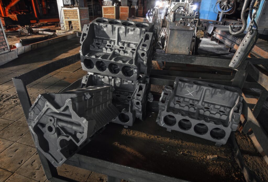 Finished eight-cylinder cylinder blocks made of cast iron in the workshop