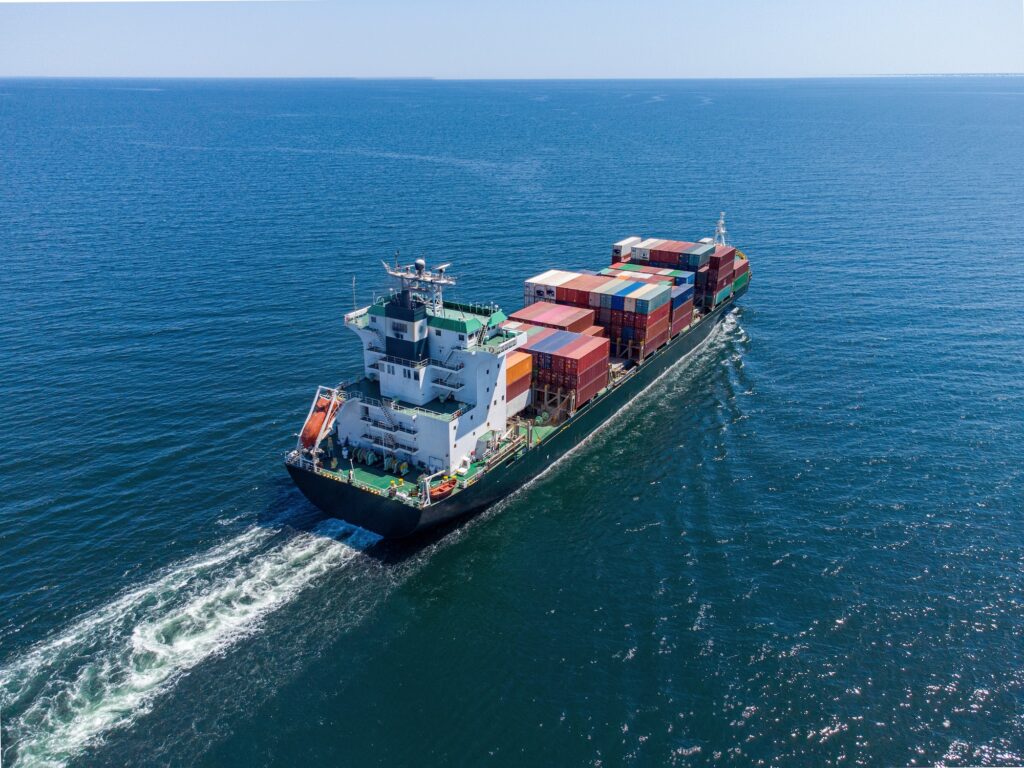 Aerial top view container ship, shipping or transportation concept background.