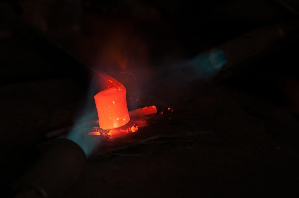 Blue oxygen flames melting steel. Metal welding iron construction manufacturing