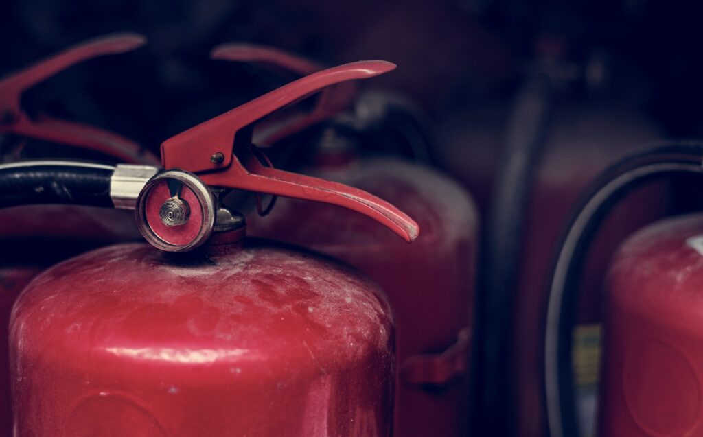 Closeup of red fire extinguishers