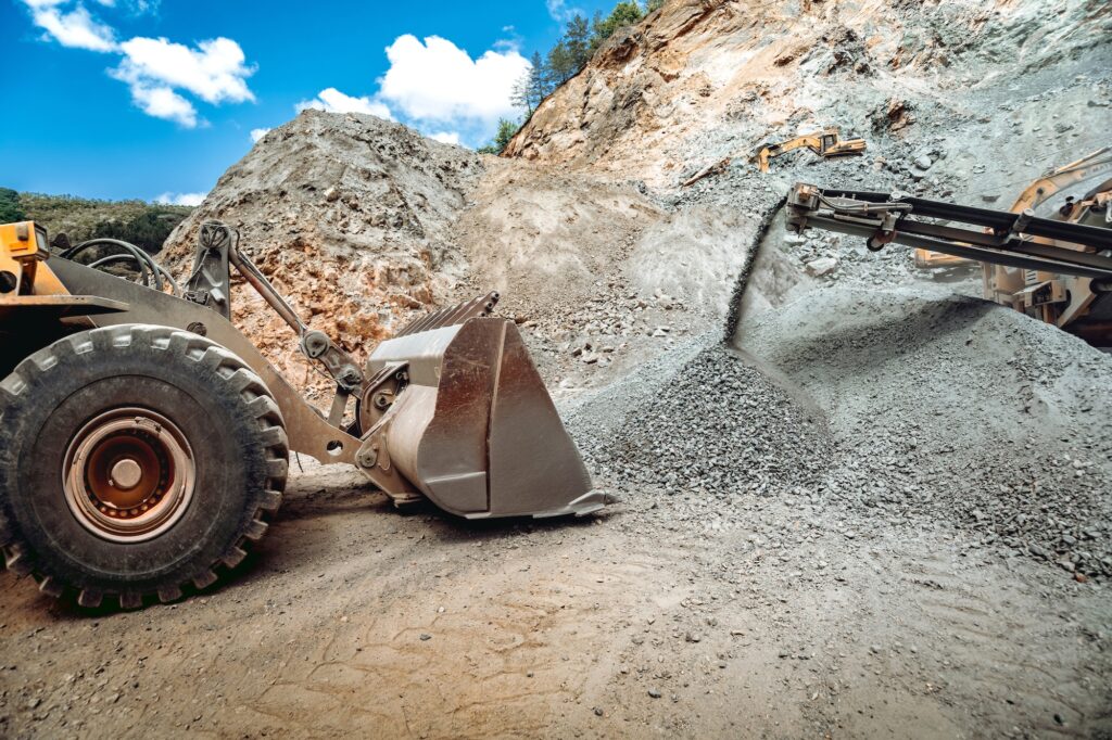 Mining industry. Industrial vehicles on construction site