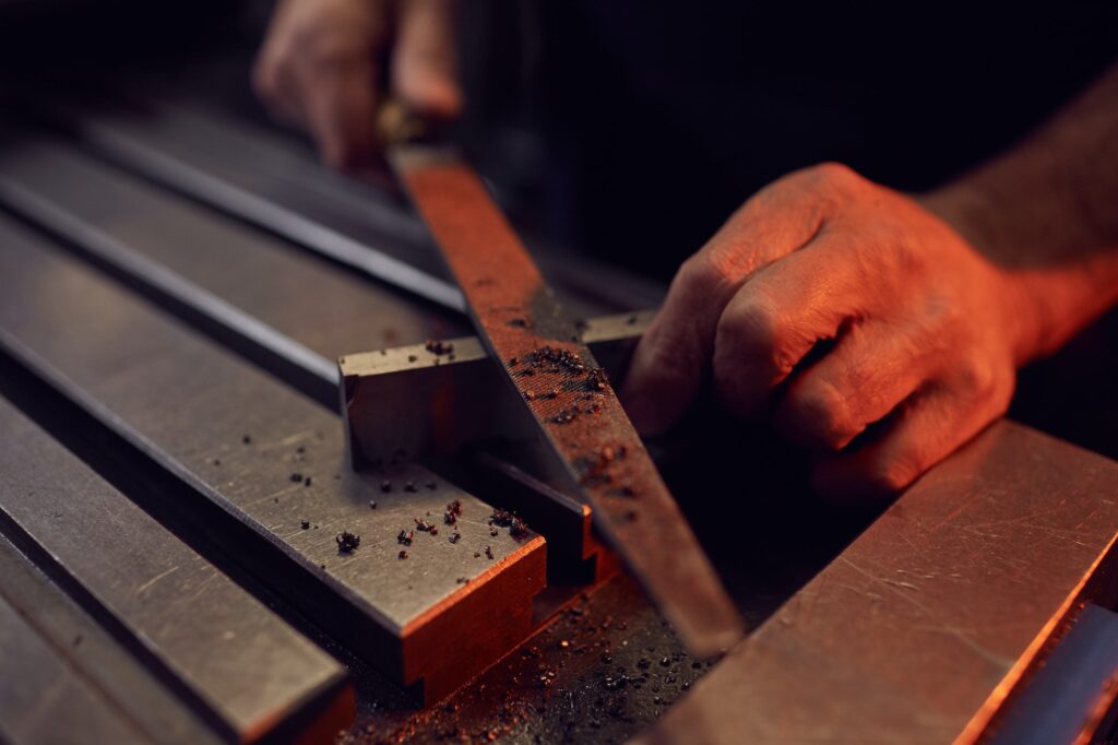 Worker working with metal